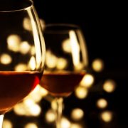 2 Red wine glasses. Christmas romantic dinner image.