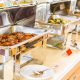 Many buffet heated trays ready for service.